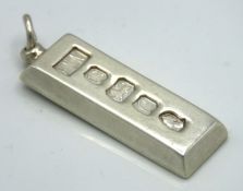 A 1977 Sheffield silver ingot, maker F&M, 50mm dro