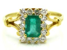 An 18ct gold ring set with emerald & approx. 0.33c