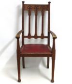An oak late 19thC. arts & crafts style armchair, 1