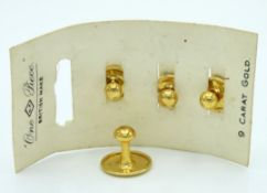 Four unused 9ct gold collar studs, one larger, thr