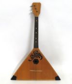 A Russian balalaika, 675mm long x 430mm at widest,