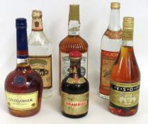 A bottle of Courvoisier Cognac, a VSOP Napoleon Br