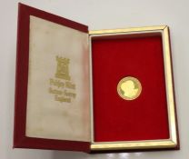 A 1981 Pobjoy Mint Charles & Diana gold proof half