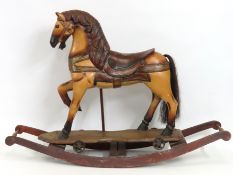 A mid 20thC. rocking horse, 1215mm wide x 830mm hi