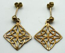 A pair of 9ct gold Celtic knot style post fit earr