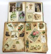 An antique 32 page scrap book featuring scraps on