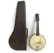 An eight string Banjolele with decorative steel ba
