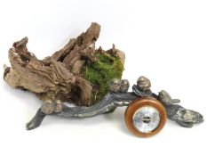 A weathered piece of gnarly wood twinned with mode