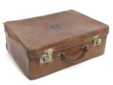An antique leather suitcase, 525mm wide x 330mm de