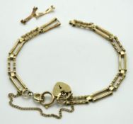 A 9ct gold bracelet, damage to one link twinned wi