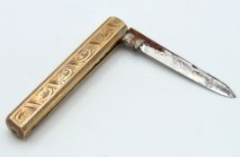A gold plated antique folding knife, 43mm wide clo