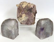 A pair of pale amethyst polished geodes twinned wi