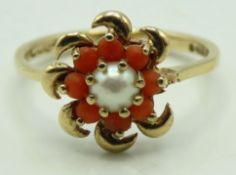 A 9ct gold ring set with red coral & pearl, lackin