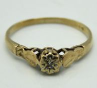 A 9ct gold solitaire ring set with small diamond, size J, 1.1g