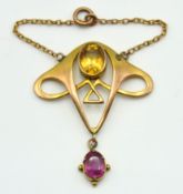 An antique 9ct gold Merle Bennett style art nouvea