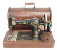 A cased Singer sewing machine
