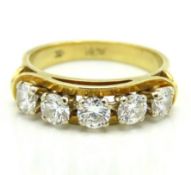A c.1960s 18ct gold half eternity ring set with ap