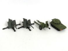 Two Dinky diecast model guns, a Dinky Alvis strike