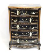 A Chinese lacquerware chest of drawers with gildin