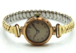 A ladies 9ct gold wristwatch, doesn't wind or run,