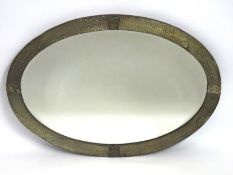 An early 20thC. arts & crafts, pewter framed mirro