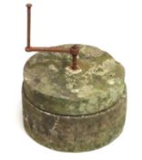 A vintage stone rotary quern or hand operated mill