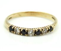 An 18ct gold diamond & sapphire ring, approx. 0.21