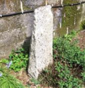 A free standing granite post, 920mm tall x 370mm wide x 260mm deep near base, no public viewing on t