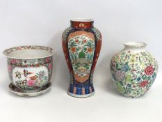 A Japanese Imari vase twinned with a decorative Or