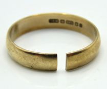 A 9ct gold band, cut, 3.2g, size W