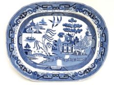 An antique willow pattern meat dish, 490mm x 398mm