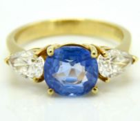 An 18ct gold ring set with a 19thC. Ceylon sapphir