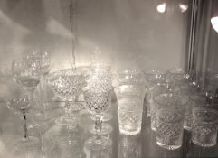 A selection of twenty one drinking glasses includi