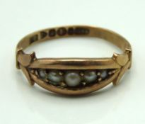 An 1889 Victorian 9ct Chester gold ring set with p