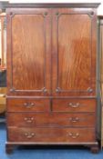 A 19thC. George III mahogany linen press with four