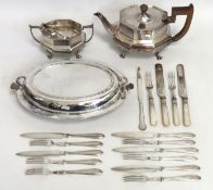 A silver plated tureen twinned with other plated w