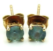 A pair of 9ct gold post fit earrings set with appr