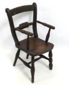An 18th/19thC. child's elm farmhouse chair, 615mm