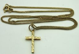 A 9ct gold cross with 460mm long chain, cross 25mm