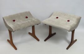A pair of reupholstered retro Austin Suite teak st