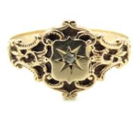 An antique yellow metal ring set with small diamon