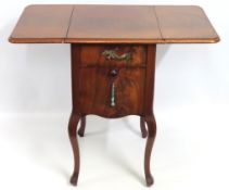A 19thC. French Louis XV style mahogany work table