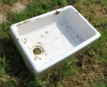 A Belfast sink, chip to internal edge & some loss to glazing as can be seen, 620mm wide x 420mm deep