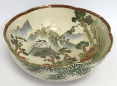 A c.1900 Japanese Satsuma bowl with landscape deco