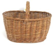 A wicker shopper, 480mm wide x 345mm deep x 260mm