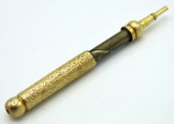 A yellow metal mechanically propelled pencil, test