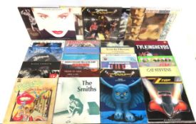 A collection of 44 vinyl LPs including Cat Stevens