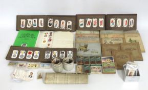 A quantity of cigarette cards including Odgen's, W