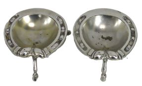 A pair of equine themed silver plated salts, 80mm