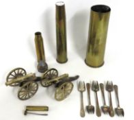 Two desk canons, one lacking towing eye, six spork